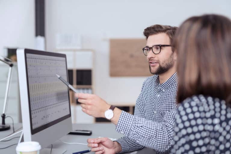 Entrepreneur Business Man and Woman Using Laptop Computer