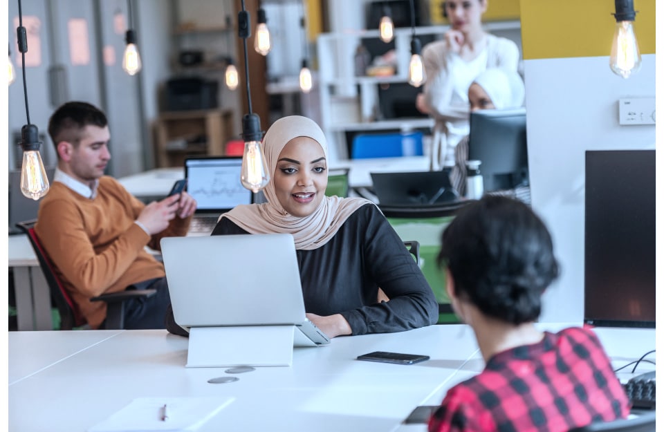 Entrepreneur Business Man and Woman Using Laptop Computer