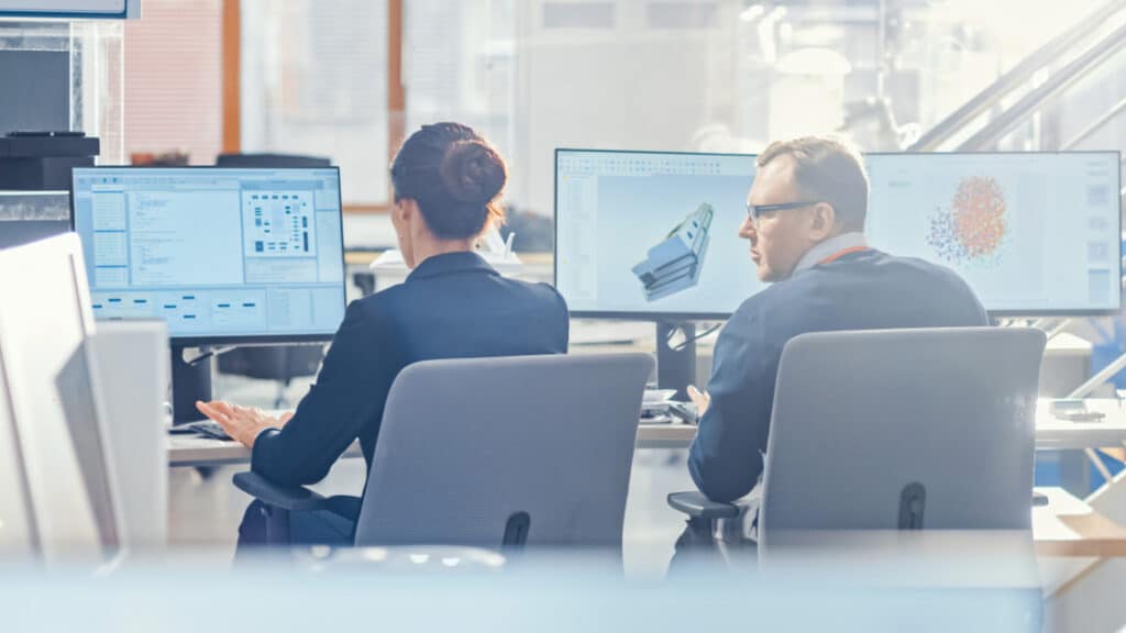 Entrepreneur Business Man and Woman Using Laptop Computer